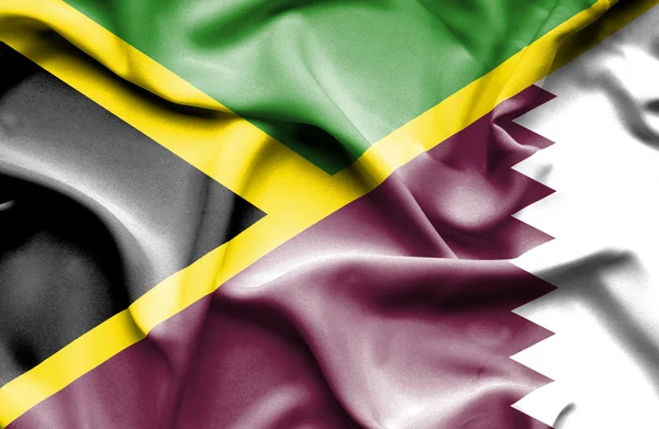 Bandera ondeante de Qatar y Jamaica — Foto de Stock