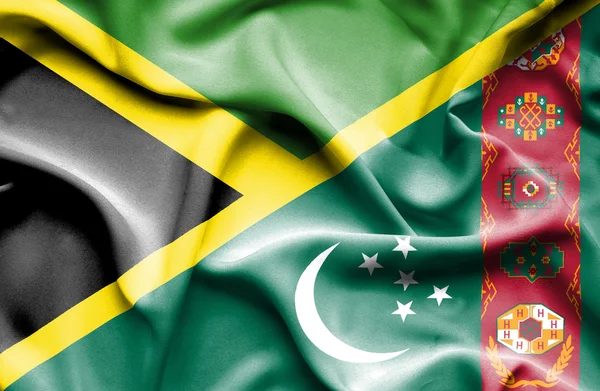 Waving flag of Turkmenistan and Jamaica — Stock Photo, Image