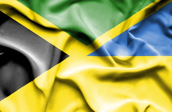 Viftande flagga Ukraina och Jamaica — Stockfoto