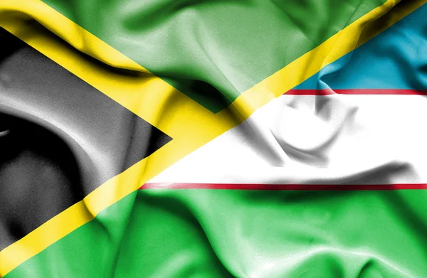 Özbekistan ve Jamaika bayrağı sallayarak — Stok fotoğraf