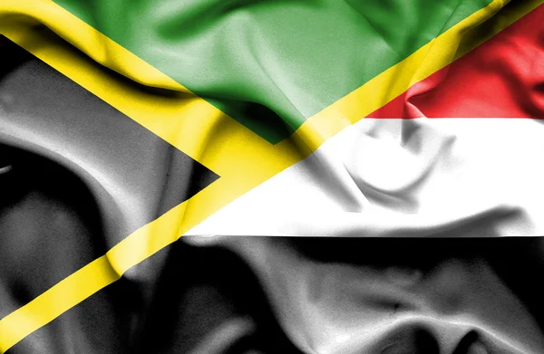 也门和牙买加那飘扬的旗帜 — 图库照片