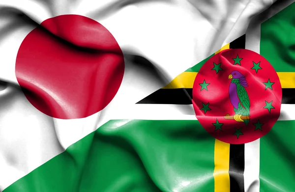ドミニカ国と日本の旗を振っています。 — ストック写真