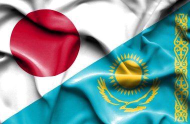 Kazakistan ve Japonya bayrağı sallayarak