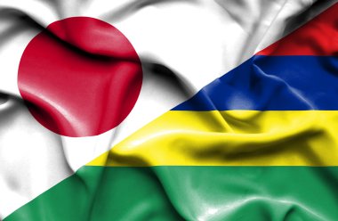 Mauritius ve Japonya bayrağı sallayarak