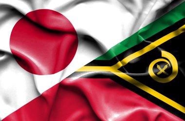 Vanuatu ve Japonya bayrağı sallayarak