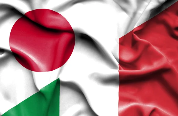 Wapperende vlag van Italië en Japan — Stockfoto