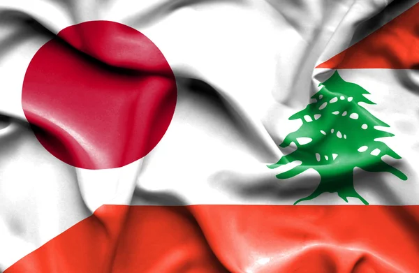 레바논과 일본의 국기를 흔들며 — 스톡 사진