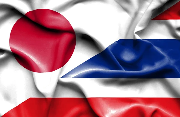 Waving flag of Thailand and Japan — Stock Photo, Image