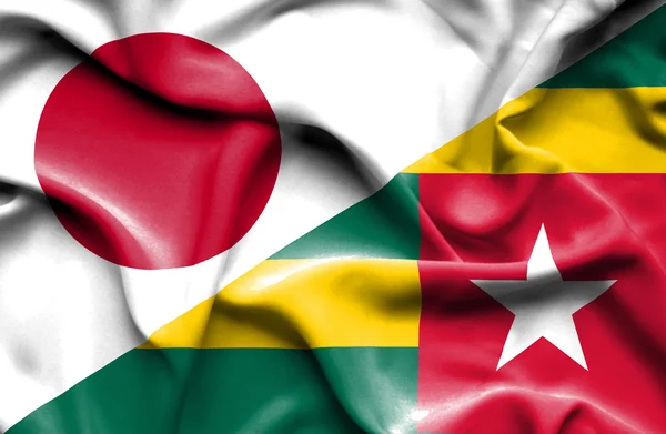 Waving flag of Togo and Japan — Stock Photo, Image