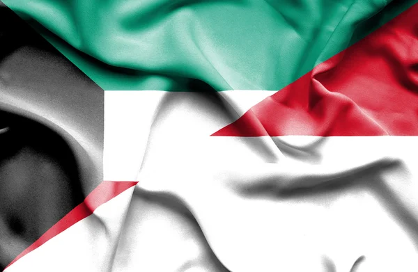 インドネシア、クウェートの国旗を振ってください。 — ストック写真