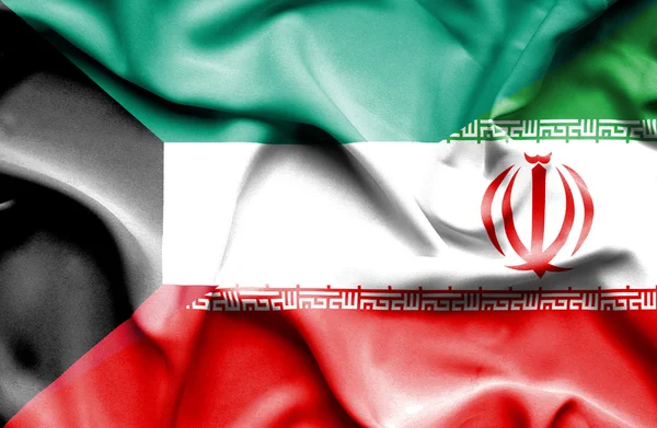 Flagge von Iran und Kuwait schwenken — Stockfoto