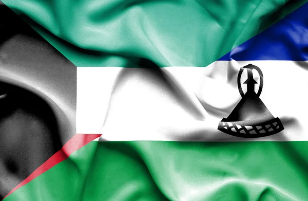 Wapperende vlag van Lesotho en Koeweit — Stockfoto