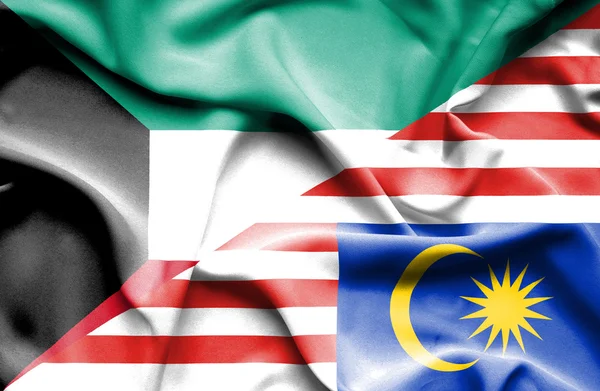Κουνώντας τη σημαία της Μαλαισίας και Κουβέιτ — Φωτογραφία Αρχείου