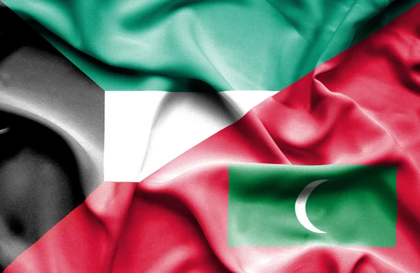 Flagge der Malediven und Kuwaits schwenken — Stockfoto