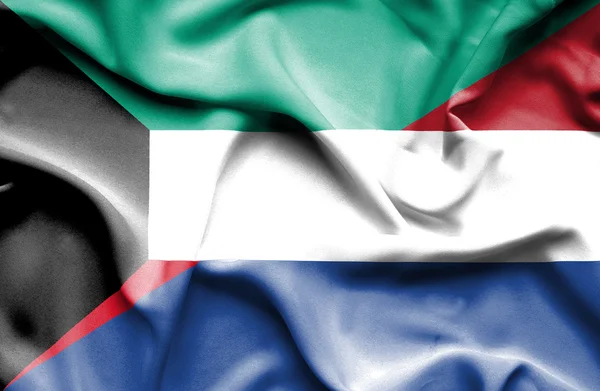 Waving flag of Netherlands and Kuwait — Stock Photo, Image