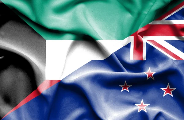 Flagge von Neuseeland und Kuwait schwenken — Stockfoto