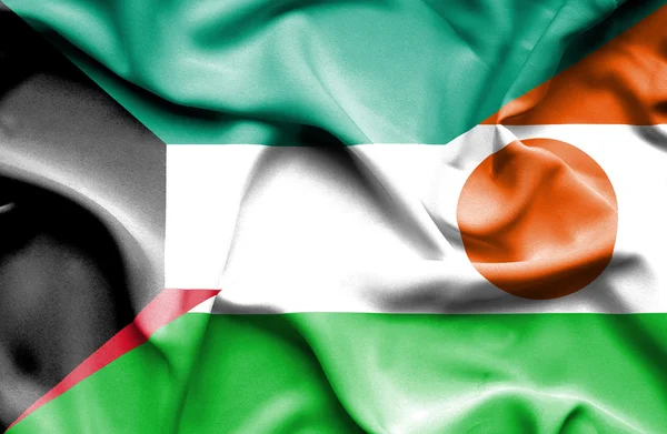 Wapperende vlag van Niger en Koeweit — Stockfoto
