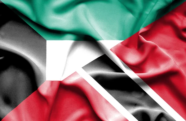 Flagge von Trinidad und Tobago und Kuwait schwenkend — Stockfoto