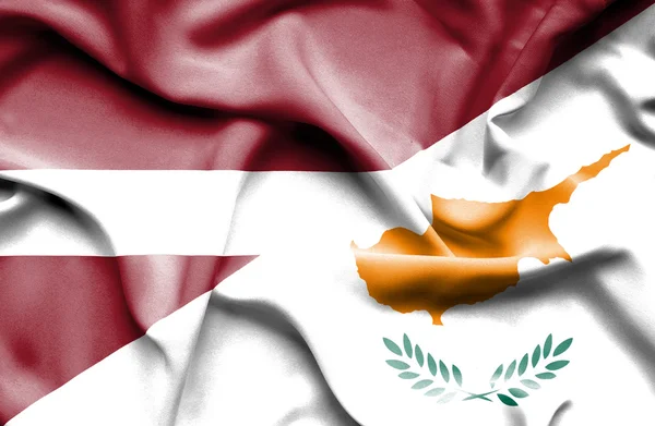 Waving flag of Cyprus and Latvia — Stock Photo, Image