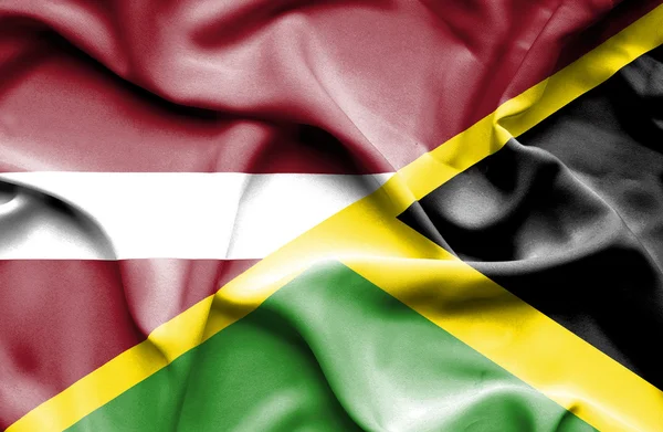 Viftande flagga Jamaica och Lettland — Stockfoto