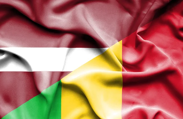 Viftande flagga Mali och Lettland — Stockfoto