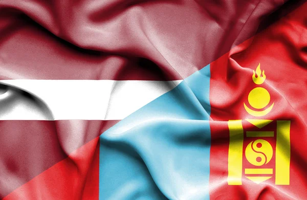 Waving flag of Mongolia and Latvia — Stock Photo, Image