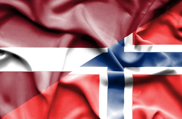 Bandera ondeante de Noruega y Letonia —  Fotos de Stock