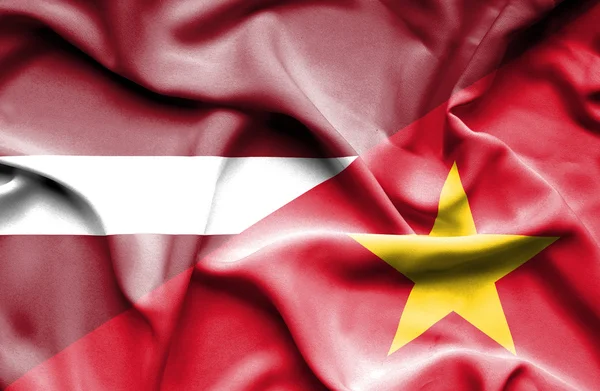 Machać flaga Wietnamu i Łotwa — Zdjęcie stockowe