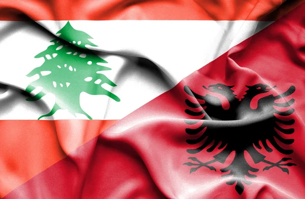 Waving flag of Albania and Lebanon — Stock Photo, Image