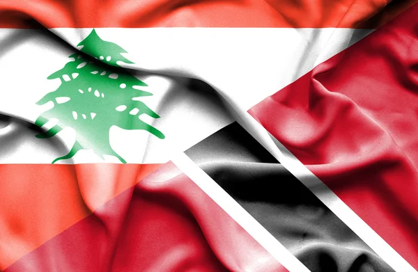 Trinidad és Tobago és Libanon hullámzó zászlaja — Stock Fotó