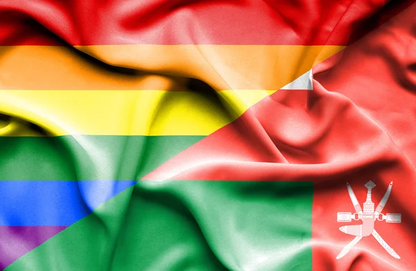 Oman och HBT-viftande flagga — Stockfoto