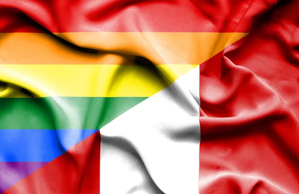Ondeando la bandera de Perú y LGBT — Foto de Stock