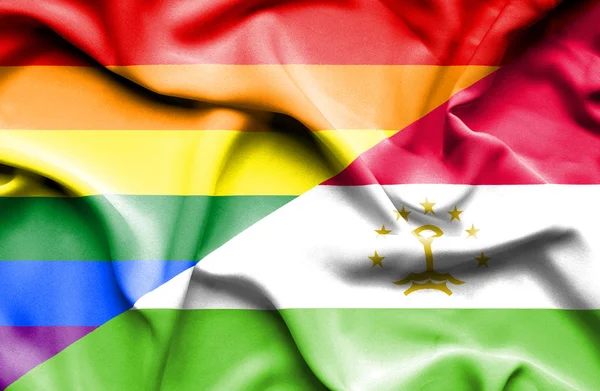 Ondeando la bandera de Tayikistán y LGBT — Foto de Stock