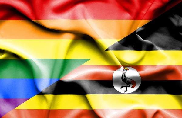 Vlající vlajka Ugandy a Lgbt — Stock fotografie