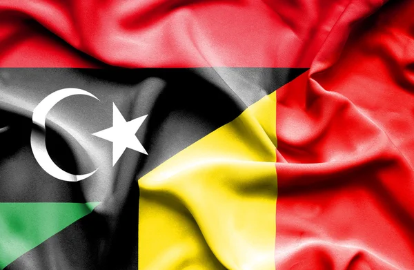 Wapperende vlag van België en Libië — Stockfoto
