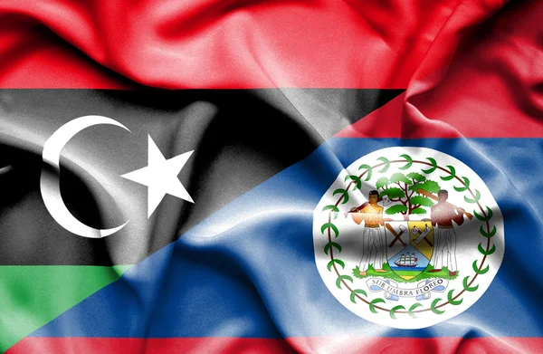 Bandera ondeante de Belice y Libia — Foto de Stock