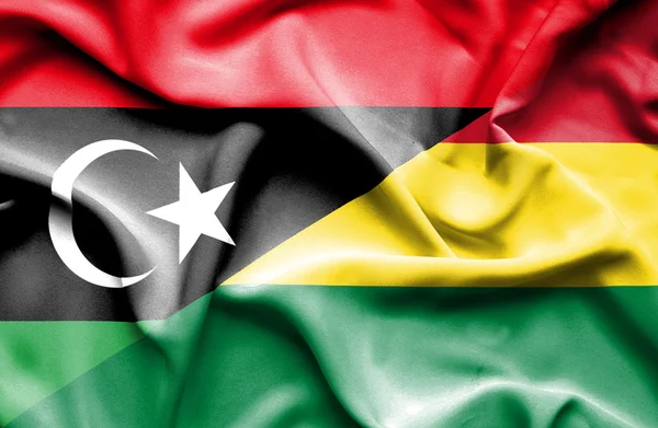 Wapperende vlag van Bolivia en Libië — Stockfoto
