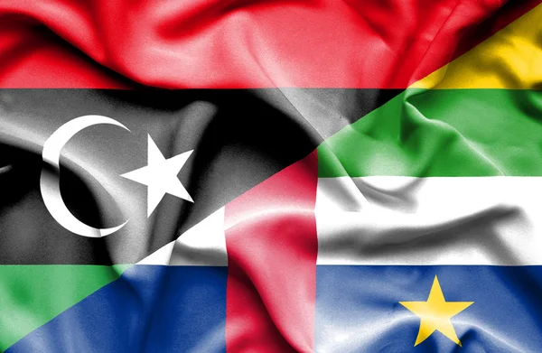 Centralafrikanska republiken och Libyen viftande flagga — Stockfoto