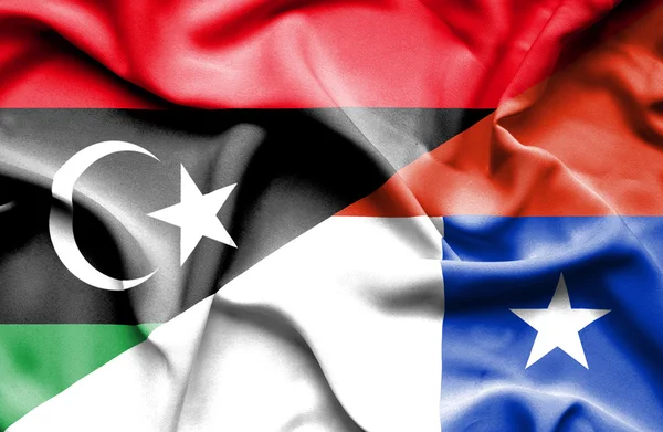 Mávání vlajkou Chile a Libye — Stock fotografie