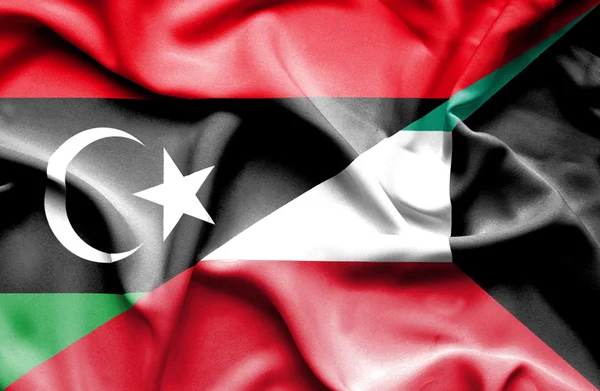 Waving flag of Kuwait and Libya — Stock Photo, Image