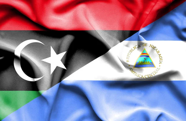 Bandera ondeante de Nicaragua y Libia —  Fotos de Stock