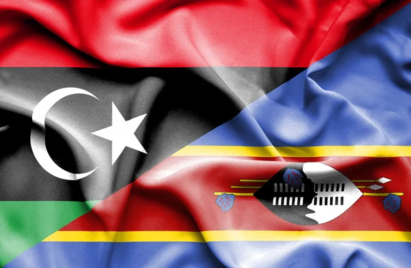 Swazliand och Libyen viftande flagga — Stockfoto