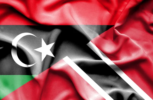 Trinidad ve Tobago ve Libya bayrağı sallayarak — Stok fotoğraf