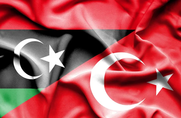 Waving flag of Turkey and Libya — Stock Photo, Image
