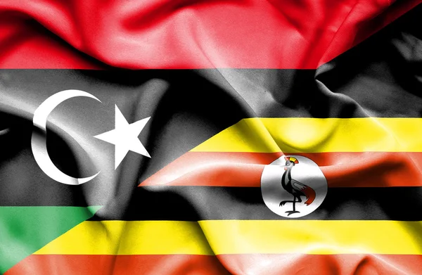 利比亚、 乌干达的那飘扬的旗帜 — 图库照片