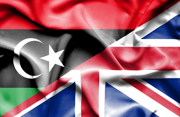 Bandiera sventolante di Regno Unito e Libia — Foto Stock