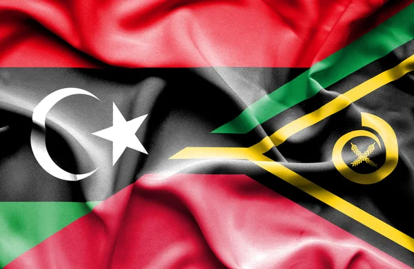 Waving flag of Vanuatu and Libya — Stock Photo, Image