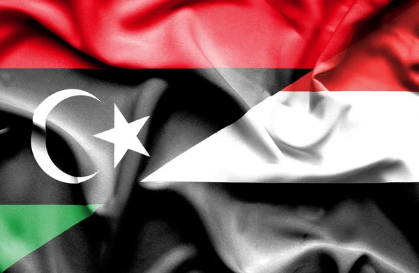 Waving flag of Yemen and Libya — Stock Photo, Image