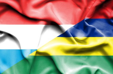 Mauritius ve Lüksemburg bayrağı sallayarak