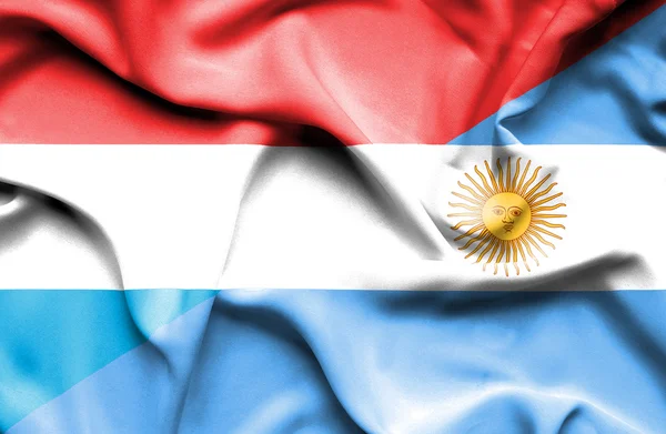 Waving flag of Argentina and Luxembourg — Stock Photo, Image